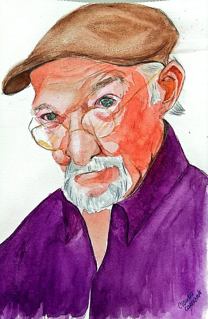 Retrato pintado em aquarela de Jaguar. Ele aparece sério, com óculos de aro dourado, boina marrom e camisa roxa. O olhar é expressivo, voltado para frente, destacando sua barba branca e fisionomia envelhecida.